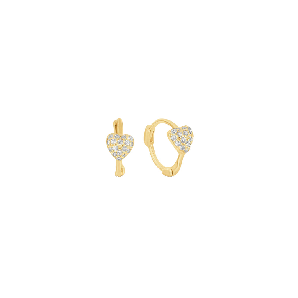 Heart-shaped gold earrings with pave stones on a white background